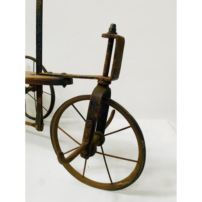 A child's toy bicycle, also known as a draisine – late 19th century