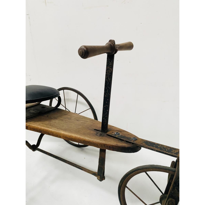 A child's toy bicycle, also known as a draisine – late 19th century