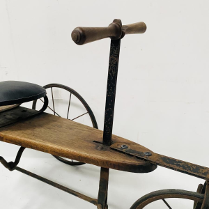 A child's toy bicycle, also known as a draisine – late 19th century