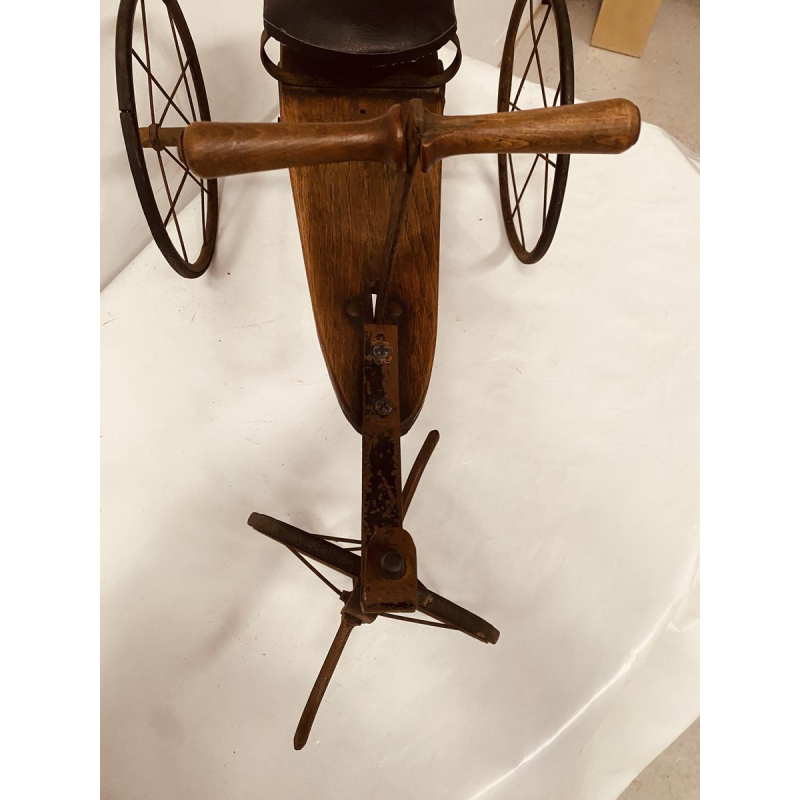 A child's toy bicycle, also known as a draisine – late 19th century