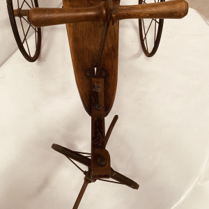 A child's toy bicycle, also known as a draisine – late 19th century