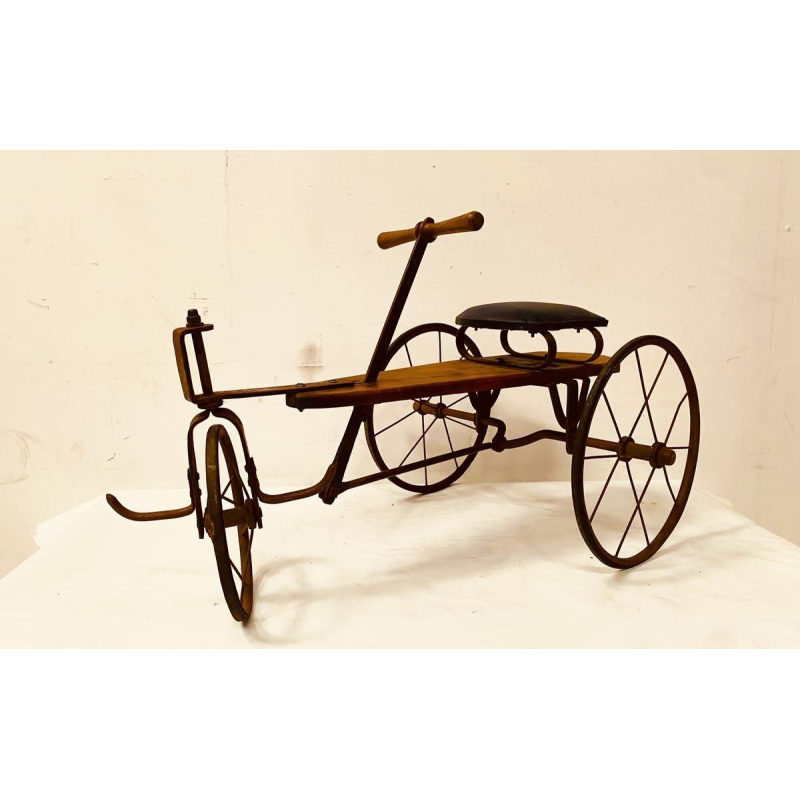 A child's toy bicycle, also known as a draisine – late 19th century