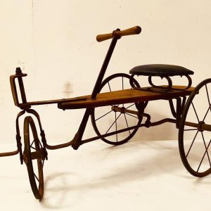 A child's toy bicycle, also known as a draisine – late 19th century