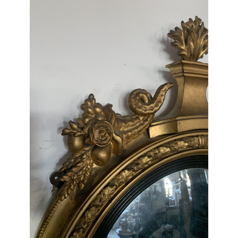 Miroir sorcière à fronton en bois sculpté et doré – XIXᵉ siècle