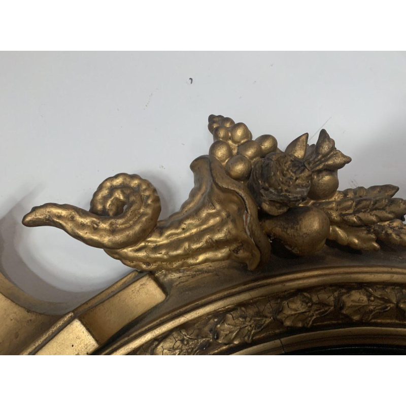 Miroir sorcière à fronton en bois sculpté et doré – XIXᵉ siècle