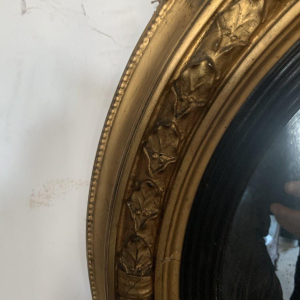 Miroir sorcière à fronton en bois sculpté et doré – XIXᵉ siècle