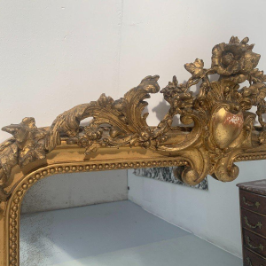 Louis XV style mirror in wood and stucco gilded with gold leaf – 19th century