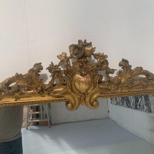 Louis XV style mirror in wood and stucco gilded with gold leaf – 19th century