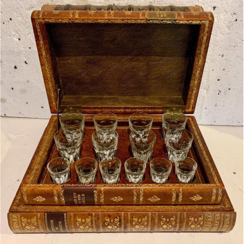 Liquor cabinet and games box disguised as antique books – 20th century