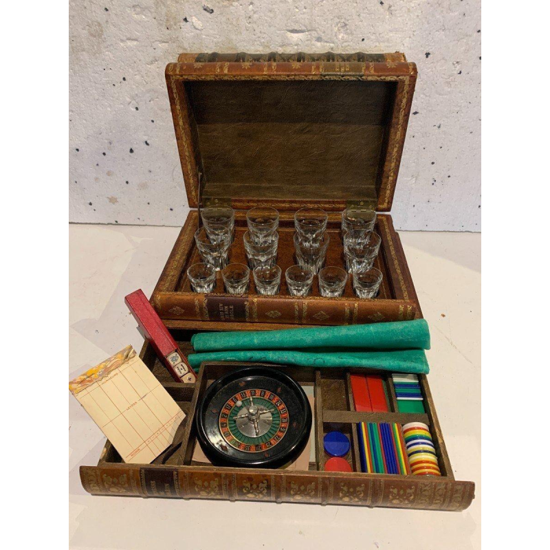 Liquor cabinet and games box disguised as antique books – 20th century
