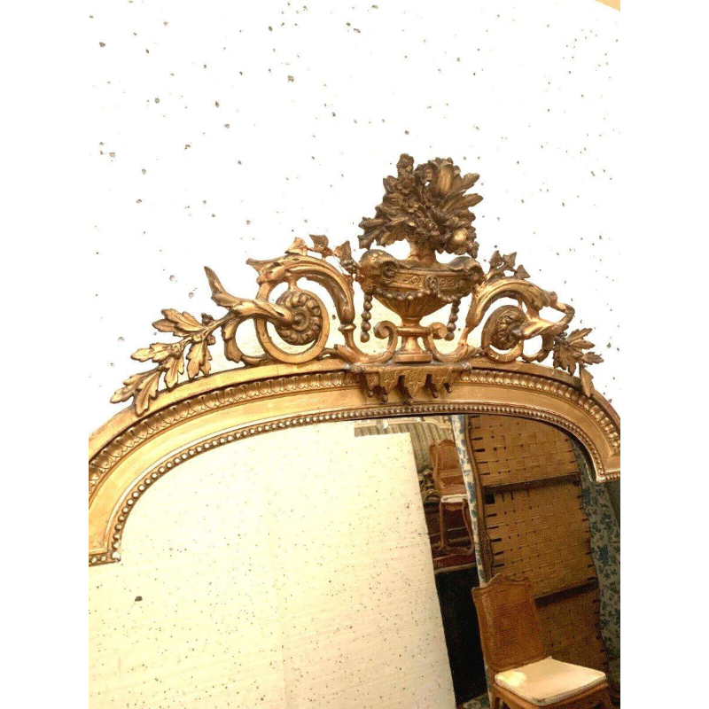 Louis XVI style mirror in wood and gilded stucco – 19th century