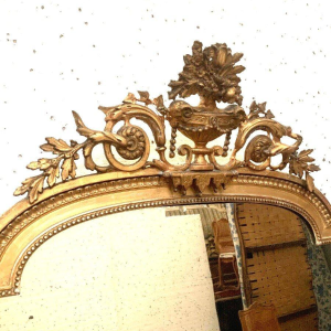 Louis XVI style mirror in wood and gilded stucco – 19th century