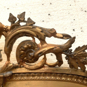 Louis XVI style mirror in wood and gilded stucco – 19th century