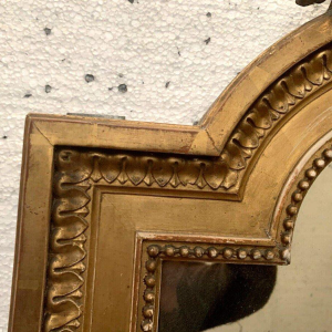 Louis XVI style mirror in wood and gilded stucco – 19th century