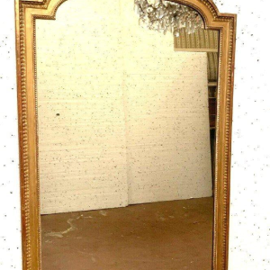 Louis XVI style mirror in wood and gilded stucco – 19th century