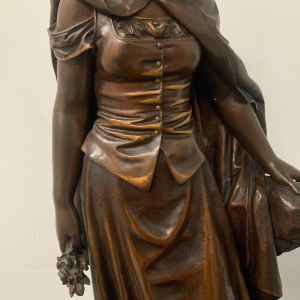 Pierre Ernst Bouret "Young Girl in a Cape" patinated bronze sculpture, 20th century