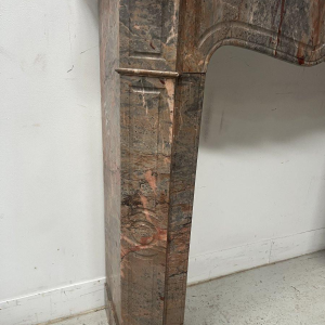 Louis XV style "Pompadour" model fireplace in pink marble, late 19th / early 20th century