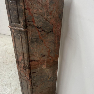 Louis XV style "Pompadour" model fireplace in pink marble, late 19th / early 20th century