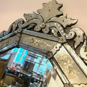 Venetian mirror with a frame and pediment, early 20th century