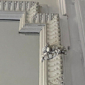 Louis XVI style mirror in carved wood, 20th century