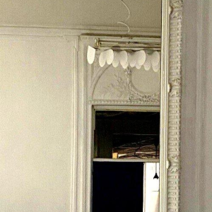 Louis XVI style mirror in carved wood, 20th century