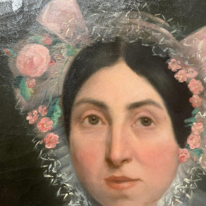 Pair of ancestral portraits, oil on canvas in gilt oval frames, 19th century