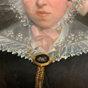 Pair of ancestral portraits, oil on canvas in gilt oval frames, 19th century