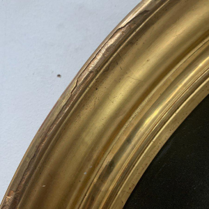 Een paar voorouderportretten, olieverf op doek in vergulde ovale lijsten, 19e eeuw.