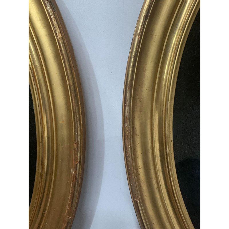 Pair of ancestral portraits, oil on canvas in gilt oval frames, 19th century
