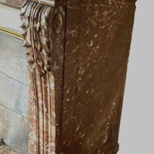 Louis XVI style fireplace in speckled red marble, 20th century