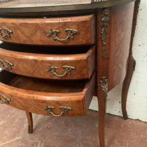 A Louis XV style half-moon commode on legs, in marquetry with a cube background, 20th century