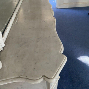 Louis XV style fireplace, Pompadour model, in white Carrara marble, 20th century