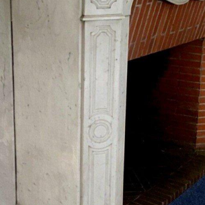 Louis XV style fireplace, Pompadour model, in white Carrara marble, 20th century