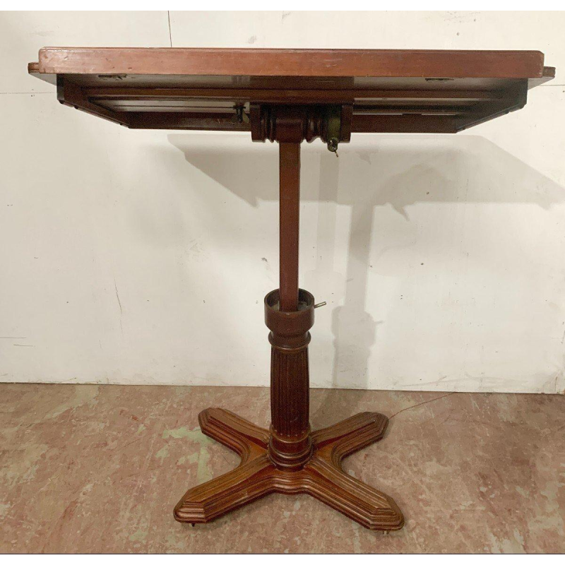Serving table with a swiveling sliding mechanism, Louis-Philippe style mahogany, 19th century