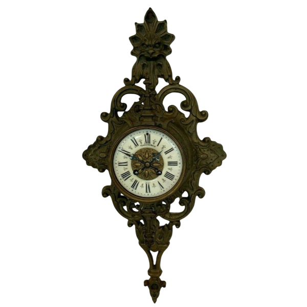GAILLIAU – NEUT, wall-mounted cartel clock, chased bronze with mascaron decoration, 19th century