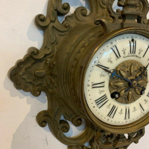 GAILLIAU – NEUT, wall-mounted cartel clock, chased bronze with mascaron decoration, 19th century