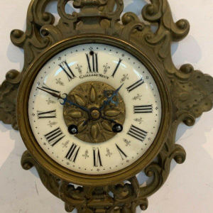 GAILLIAU – NEUT, wall-mounted cartel clock, chased bronze with mascaron decoration, 19th century