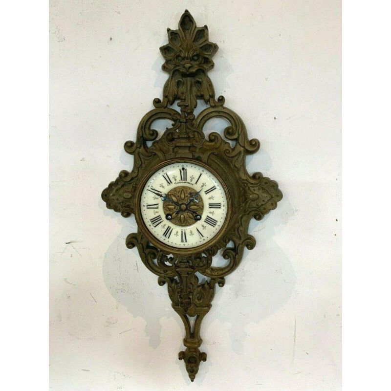 GAILLIAU – NEUT, wall-mounted cartel clock, chased bronze with mascaron decoration, 19th century
