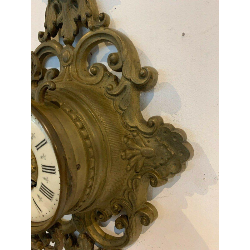 GAILLIAU – NEUT, horloge cartel d’applique, bronze ciselé à décor de mascaron, XIX siècle