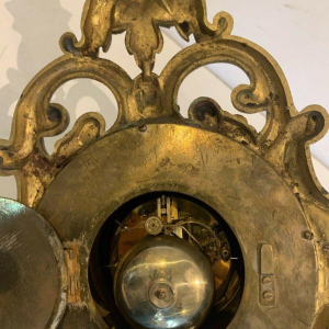 GAILLIAU – NEUT, wall-mounted cartel clock, chased bronze with mascaron decoration, 19th century