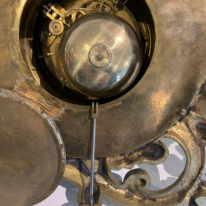 GAILLIAU – NEUT, wall-mounted cartel clock, chased bronze with mascaron decoration, 19th century