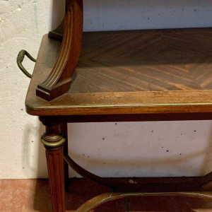 A Louis XVI style mahogany serving table with two tiers, 19th century