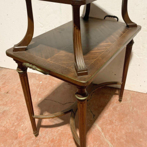 A Louis XVI style mahogany serving table with two tiers, 19th century