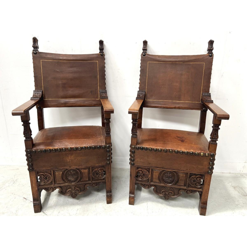 Pair of Renaissance-style walnut armchairs, late 19th – early 20th century