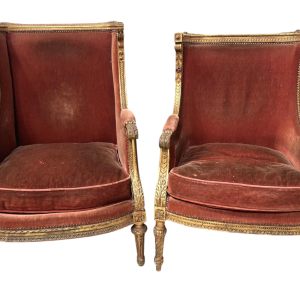 Pair of wingback armchairs, Louis XVI style, giltwood, early 20th century
