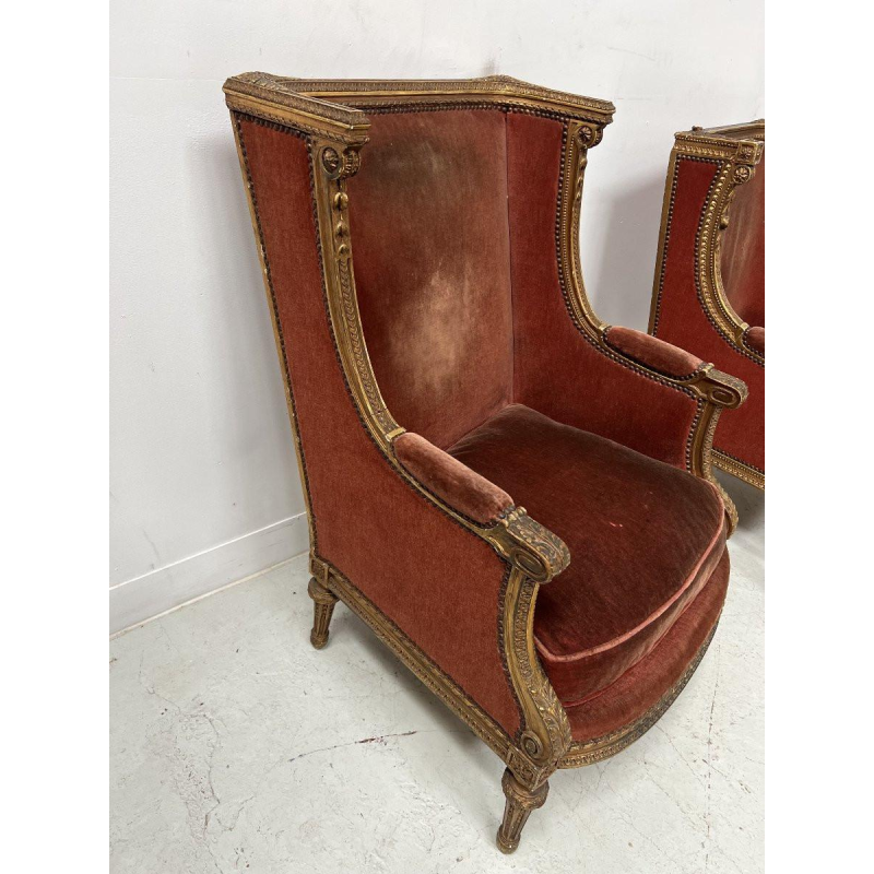 Pair of wingback armchairs, Louis XVI style, giltwood, early 20th century