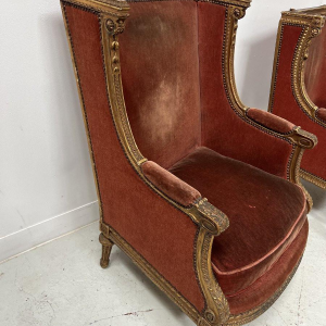 Pair of wingback armchairs, Louis XVI style, giltwood, early 20th century