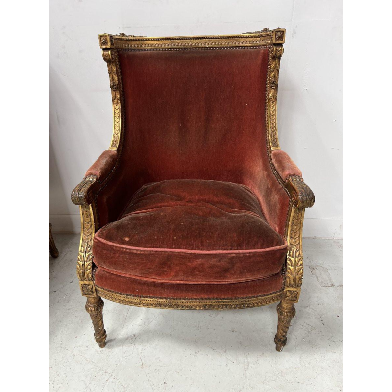 Paire de bergères à oreilles, style Louis XVI, bois doré, début XXᵉ siècle