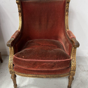 Pair of wingback armchairs, Louis XVI style, giltwood, early 20th century