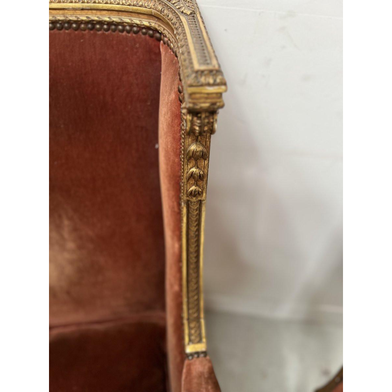 Paire de bergères à oreilles, style Louis XVI, bois doré, début XXᵉ siècle